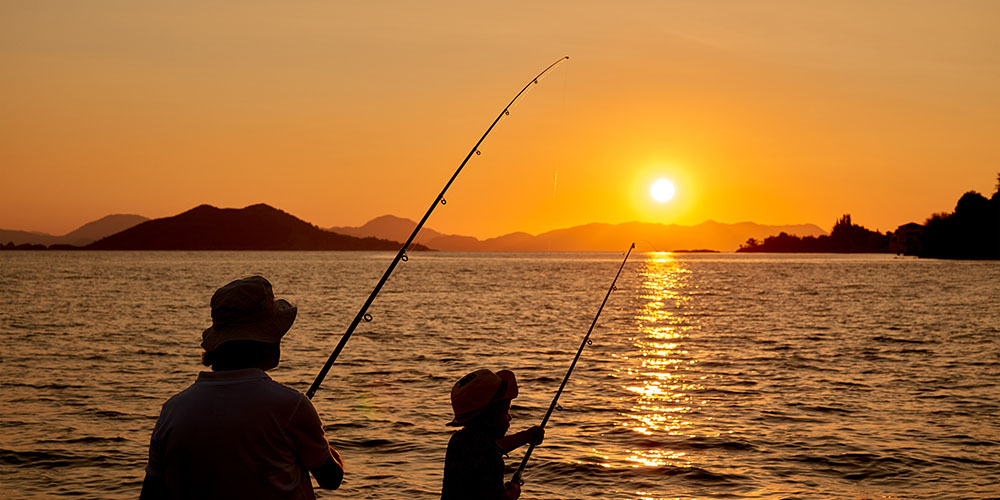 Man on Fishing Pier stock image. Image of sunset, harvey - 269720267